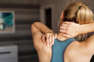 patient suffering from chronic neck and shoulder pain seeking treatment