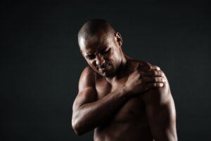Man is suffering form Shoulder pain