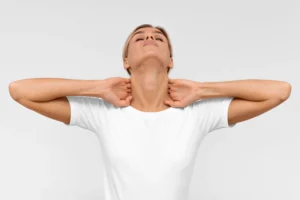 Woman is holding her neck as she is suffering from Sternocleidomastoid Syndrome