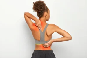 woman is suffering form Back Pain
