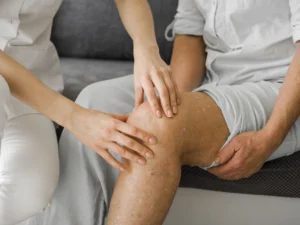 man is sitting in MVM clinic for the treatment