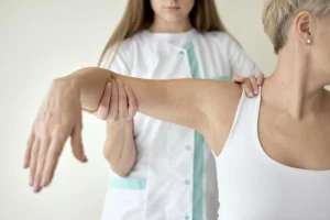 woman is getting treatment in MVM clinic of Swift Percutaneous Sacroiliac Joint