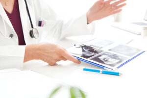 Doctor is explaining about Fluoroscopy vs. Ultrasound at MVM Clinic