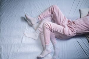 woman is suffering from restless sleep