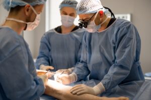 Three Confident Performing Surgical for veins