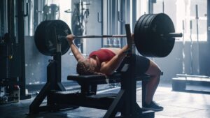 woman is doing workout at gym