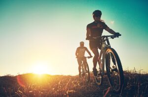 couple doing cycling after successful got the treatment at MVM Health clinic