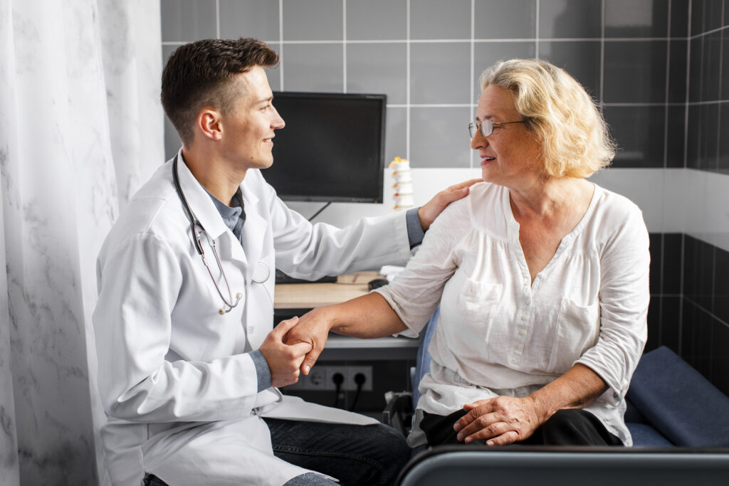 Healthcare professional providing care and support to a senior patient seeking Chronic Pain Doctor Near Me